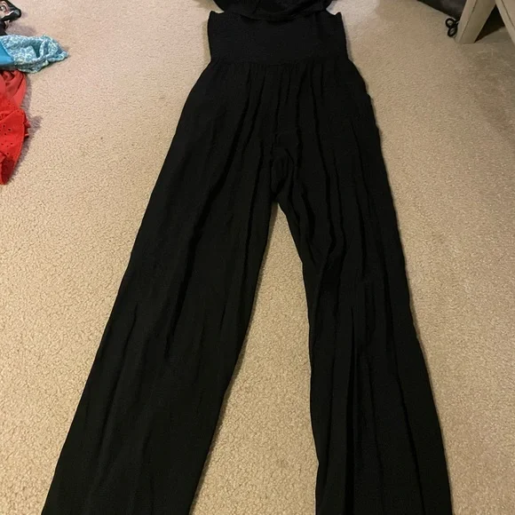 Juniors black jumpsuit- off the shoulder. Flowing relaxed leg fit. - Picture 1 of 3